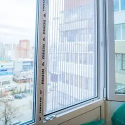 Москитная сетка плиссе на балконное окно
